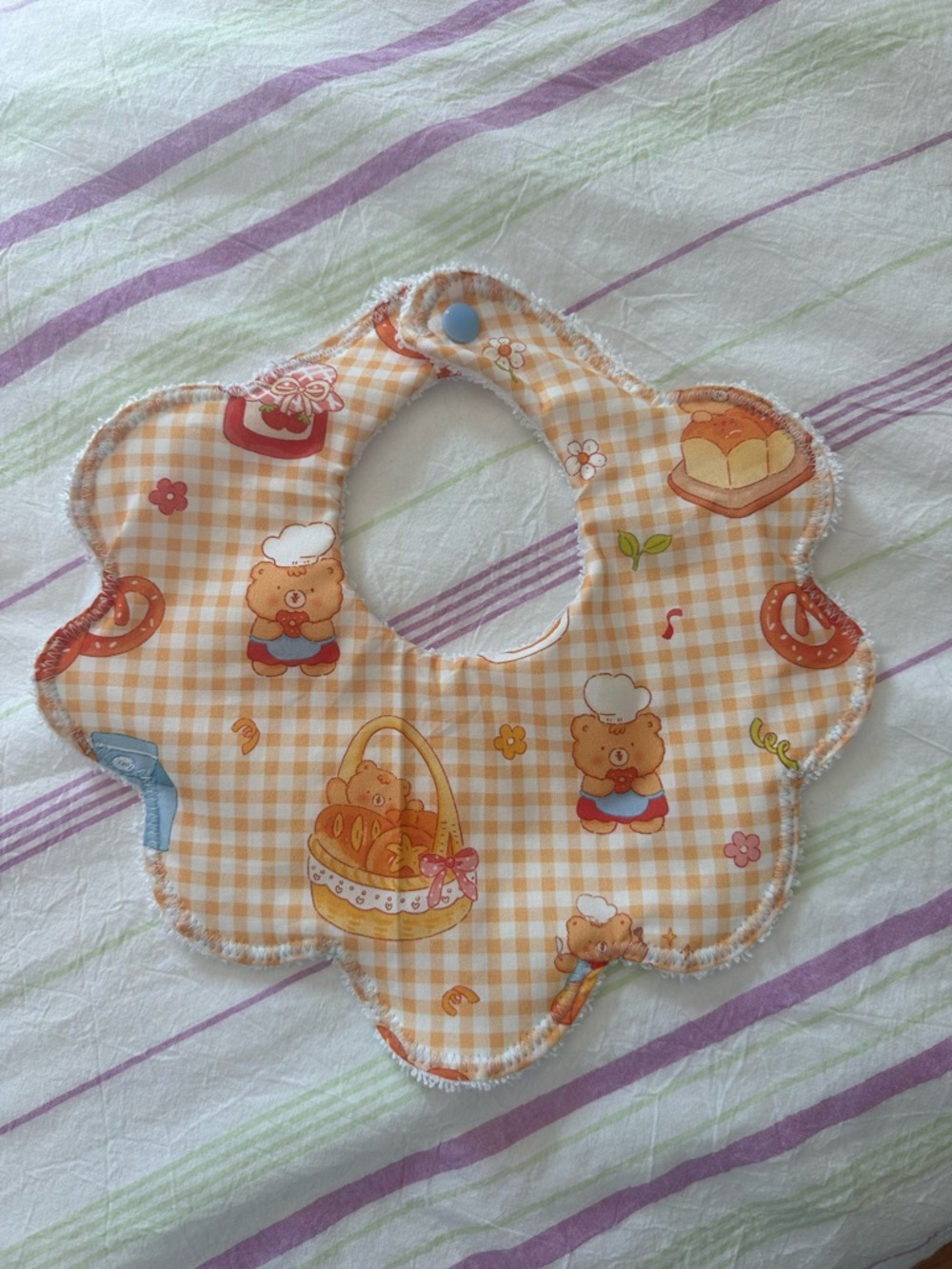 Baby Floral Scalloped Bib in Orange Gingham